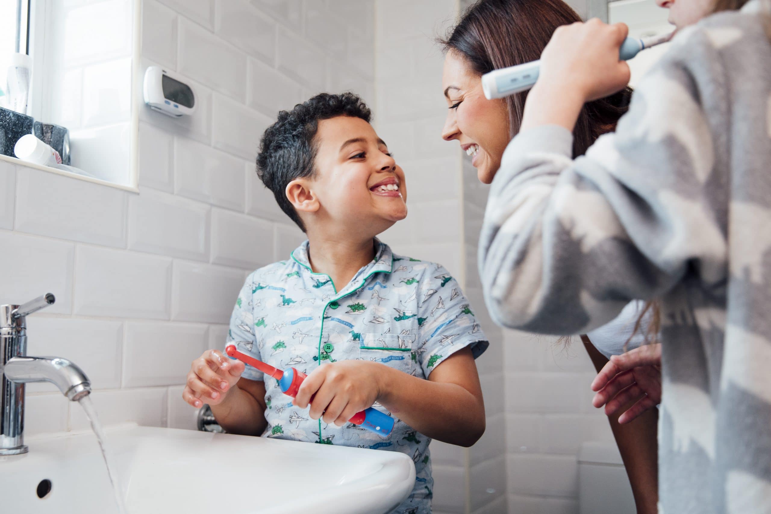 Picture of a mother and son brushing their teeth